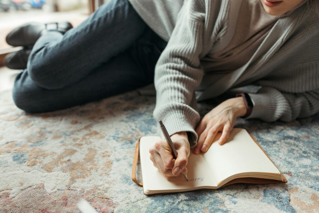 writing in a journal during a calm and reflective moment