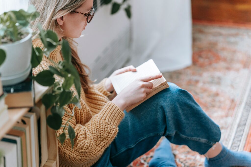 reading books in a quiet and cozy corner at home