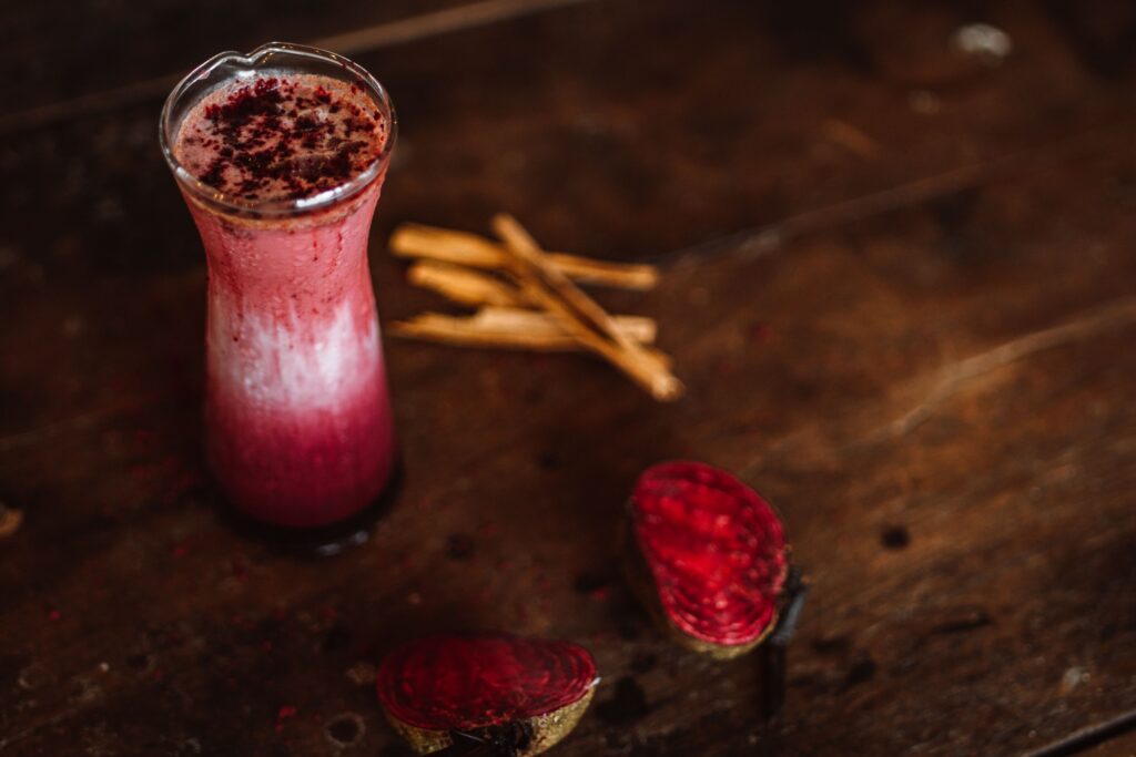 Berry breakfast smoothie served in a glass as a quick and convenient morning meal.